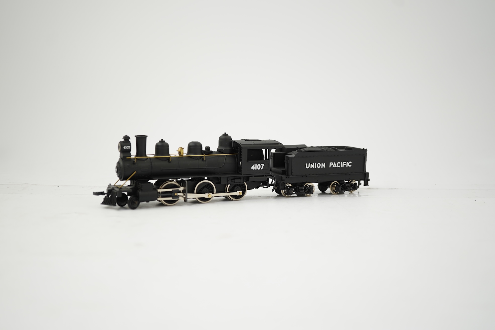 Two boxed HO gauge Union Pacific locomotives; a Genesis (G9008) model of USRA, 2495, 2-8-2 locomotive with bogie tender, together with a Mantua (313-003) 2-6-0 Mogul locomotive with bogie tender, both powered for two rai